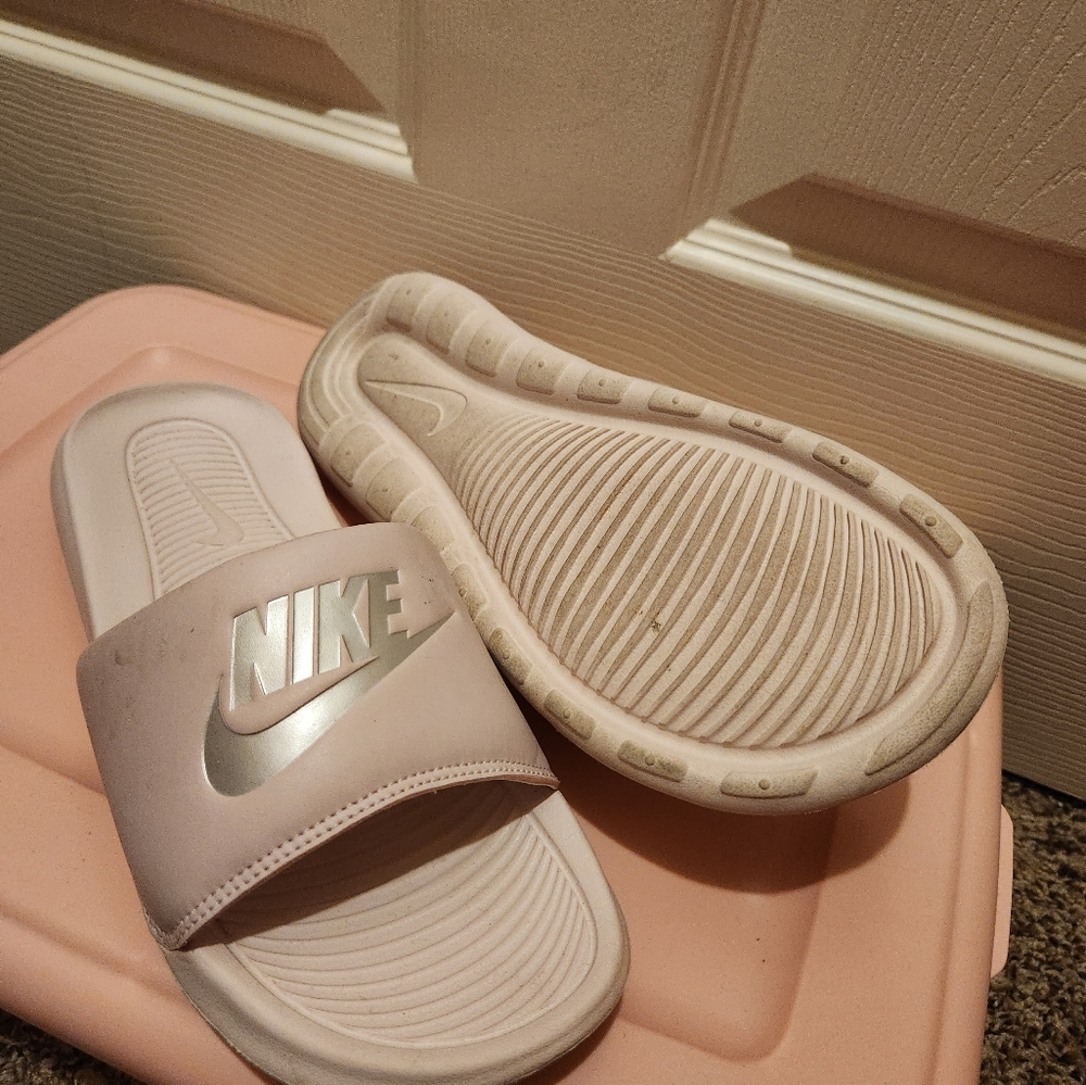 Pink Nike slides
